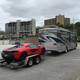 Illustration for article titled How This Big Ass RV Helped Us Sling A $240,000 Supercar Around A Dirt Track